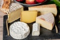 Camembert of Normandy with different french cheeses Royalty Free Stock Photo