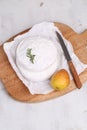 Camembert with pear on a white background.