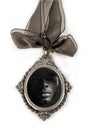 Cameo silver locket with african male portrait Royalty Free Stock Photo