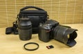 Camera with additional lens to pack into the bag. Royalty Free Stock Photo