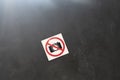 a camera banned symbol icon sticker on the wall in public place, shooting restriction area