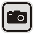 Camera, black silhouette, vector icon, gray and black frame Royalty Free Stock Photo