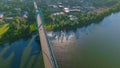 Flying over the Willamette River & St Johns Bridge, the camera captures the dual gothic towers and the sun flickering on the river