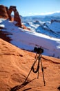 Camera at delicate arch Royalty Free Stock Photo