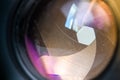 Camera diaphragm aperture with flare and reflection on lens Royalty Free Stock Photo