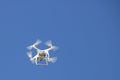 Camera drone close-up in the blue sky