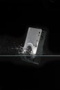 Camera dropped into water. Royalty Free Stock Photo