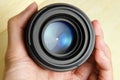 Camera dslr lens with hand holding
