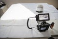 Camera with external screen for recording on a technical drawing, video shooting for a company Royalty Free Stock Photo