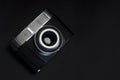 Film camera on black background Royalty Free Stock Photo