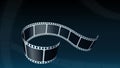 Camera film roll isolated on abstract blue background. Realistic film strip in perspective for projection, movie and cinema design