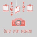 Camera girlnda of hearts and photos.enjoy every moment lettering. Royalty Free Stock Photo