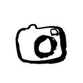 Camera grunge icon. Vector photocamera dry brush illustration.