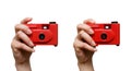 Camera in a hand isolated on white background Royalty Free Stock Photo