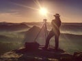 Camera in hands of creating  girl photographer. Marvelous day Royalty Free Stock Photo