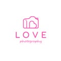 Camera and Heart symbol for love photography logo design