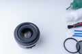 Camera lens and accessories for cleaning the camera on a white background Royalty Free Stock Photo