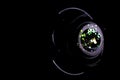 Camera lens macro photo. flare lights on shutter. Video equipment background. Abstract bokeh lights and optical leaking Royalty Free Stock Photo
