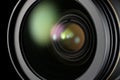Camera lens reflecting light, capturing technology and photography Royalty Free Stock Photo