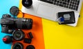 A camera, lenses, filters, batteries, memory cards, a hard drive and a blower to clean the lenses Royalty Free Stock Photo