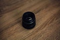 Camera lenses on a wooden table top view. background and workspace for photography