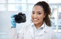 Camera, medical and portrait of black woman in forensics laboratory for investigation, crime scene and evidence