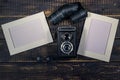 Camera medium format on a wooden table Royalty Free Stock Photo