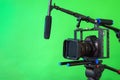 camera,microphone, lights and a green screen Royalty Free Stock Photo