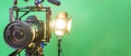 camera,microphone, lights and a green screen Royalty Free Stock Photo
