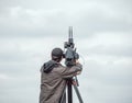 Camera operator filming an event in Bucharest, Romania, using a modern video camera