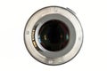 Camera photo lens close-up on white background with lense reflections. Royalty Free Stock Photo