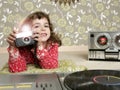 Camera retro photo little girl in vintage room Royalty Free Stock Photo