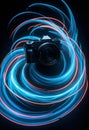 a camera is shown in front of a blue and red light trails Royalty Free Stock Photo