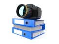 Camera on stack of ring binders