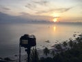 camera take sunrise picture over sea and beach at Hua Hin, Thailand