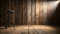 Camera on tripod against rustic wooden wall with spotlight Royalty Free Stock Photo