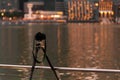 Camera on tripod shooting beautiful city