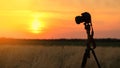 Camera tripod sunset Royalty Free Stock Photo