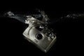 Camera underwater - sinking camera. Royalty Free Stock Photo