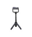 Camera and video with small black stand on a white background with clipping path Royalty Free Stock Photo