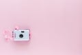 Camera waterproof toy on pink background