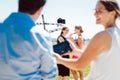 Cameraman with camera on a crane on video production set Royalty Free Stock Photo