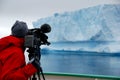 Cameraman filming in antarctica Royalty Free Stock Photo