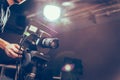 Cameraman operates a film camera, broadcasting studio Royalty Free Stock Photo