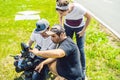 A cameraman operator discuss the shooting process with a director and dp