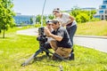 A cameraman operator discuss the shooting process with a director and dp