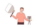 Cameraman with photographic equipment flat vector illustration. Professional photographer holding softbox and mirrorless