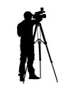 Cameraman silhouette with video camera. Royalty Free Stock Photo