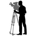 Cameraman with video camera. Silhouettes on white background