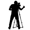 Cameraman with video camera. Silhouettes on white background